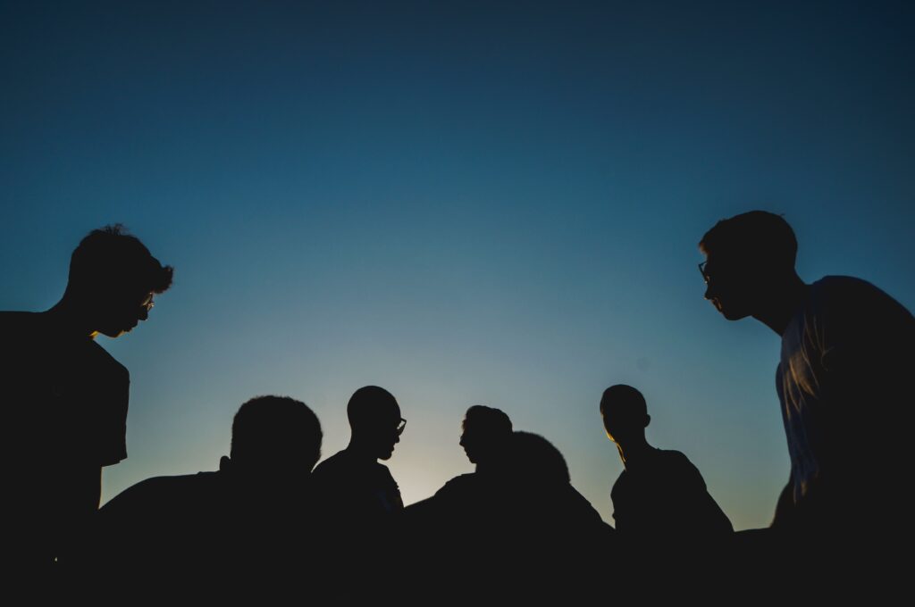 Group of People Silhouetted Against the Sky