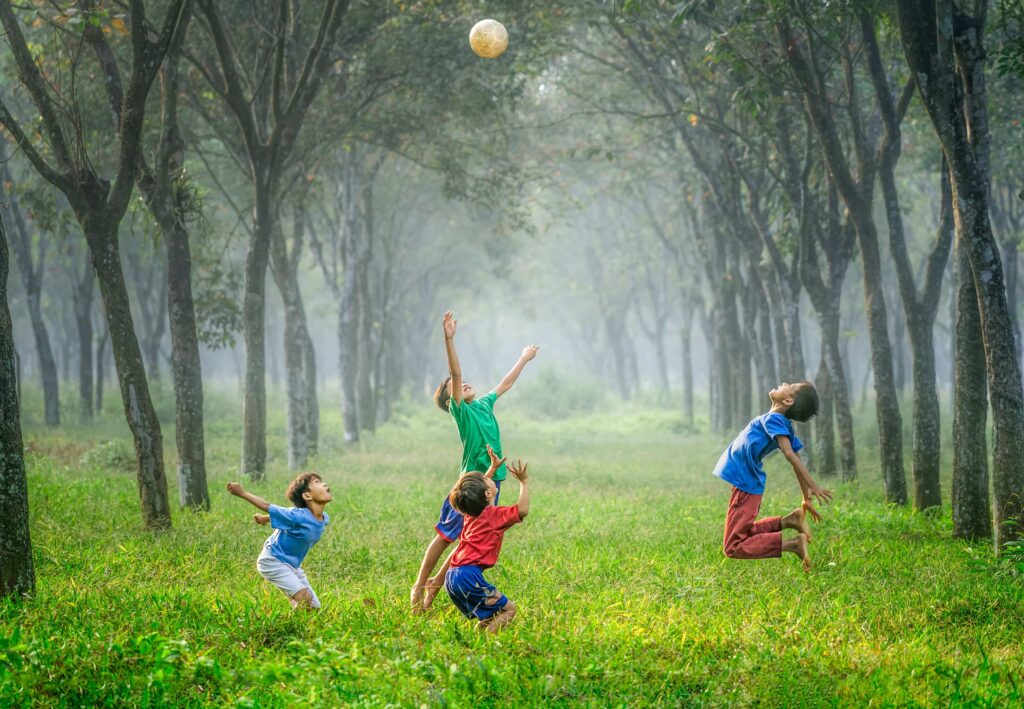 Children Playing in a Field