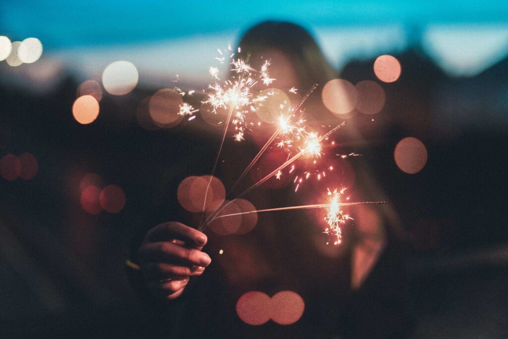 Woman Holding Fireworks Sticks